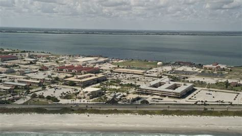 5K Stock Footage Aerial Video Of Flying By The Buildings At Patrick Air Force Base Florida