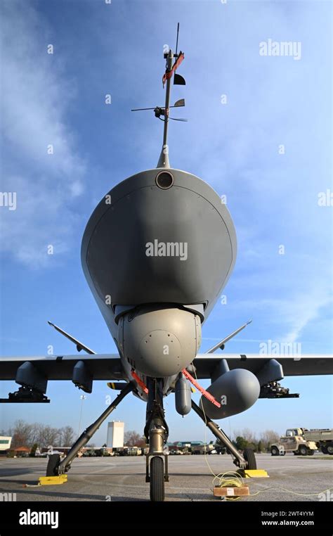 A Remotely Piloted Mq 9 Reaper From The 163Rd Attack Wing Sits In Front Of The 178Th Wing Hanger