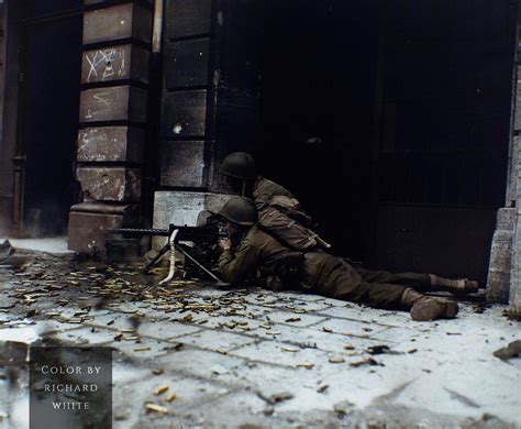 A Us Army Machine Gun Crew From The 2Nd Battalion 26Th Infantry Division With A M1919 Browning