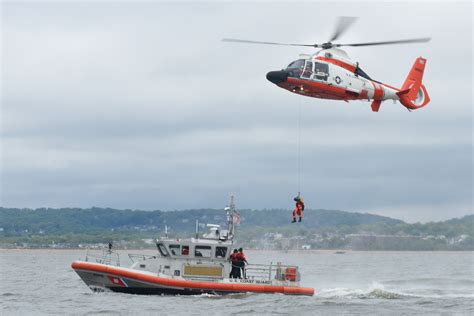 Coast Guard Helicopter Rescues 3 Commercial Fishermen Military Com