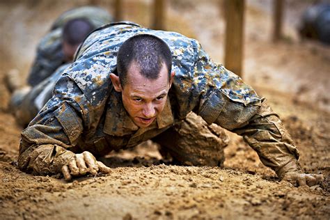 File Defense Gov News Photo 120309 A Ao884 167 Soldiers Low Crawl While Negotiating An