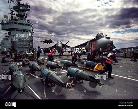 Harrier Jump Jet Landing On The Royal Navy Aircraft Carrier Hms Illustrious Stock Photo Alamy