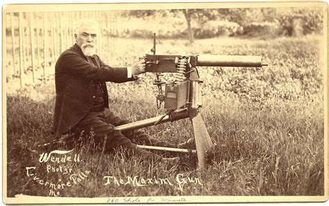 Hiram Maxim Posing With His Invention The Maxim Gun The World S First