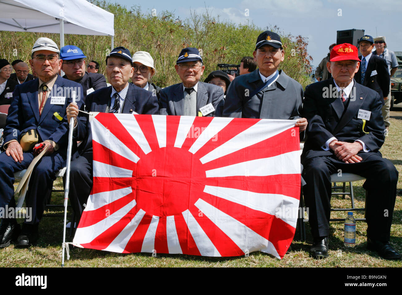 Japanese Wwii Survivors With A Japanese Battle Flag At The Reunion Of Stock Photo Royalty Free