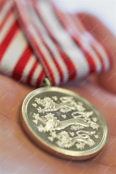 Premium Photo Closeup Hands And War Medal For Hero Service And