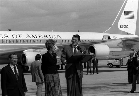 President Ronald Reagan With His Wife Nancy Beside Him Speaks To A Group During His Visit To