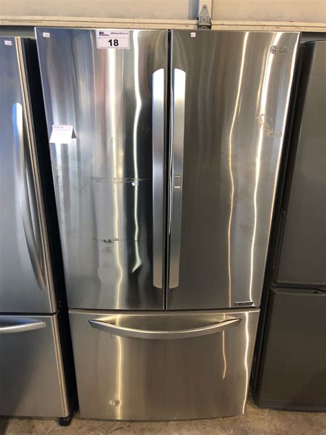 Scratch Dent Lg Stainless Steel And Grey French Door Fridge With Roll Out Freezer And Water And