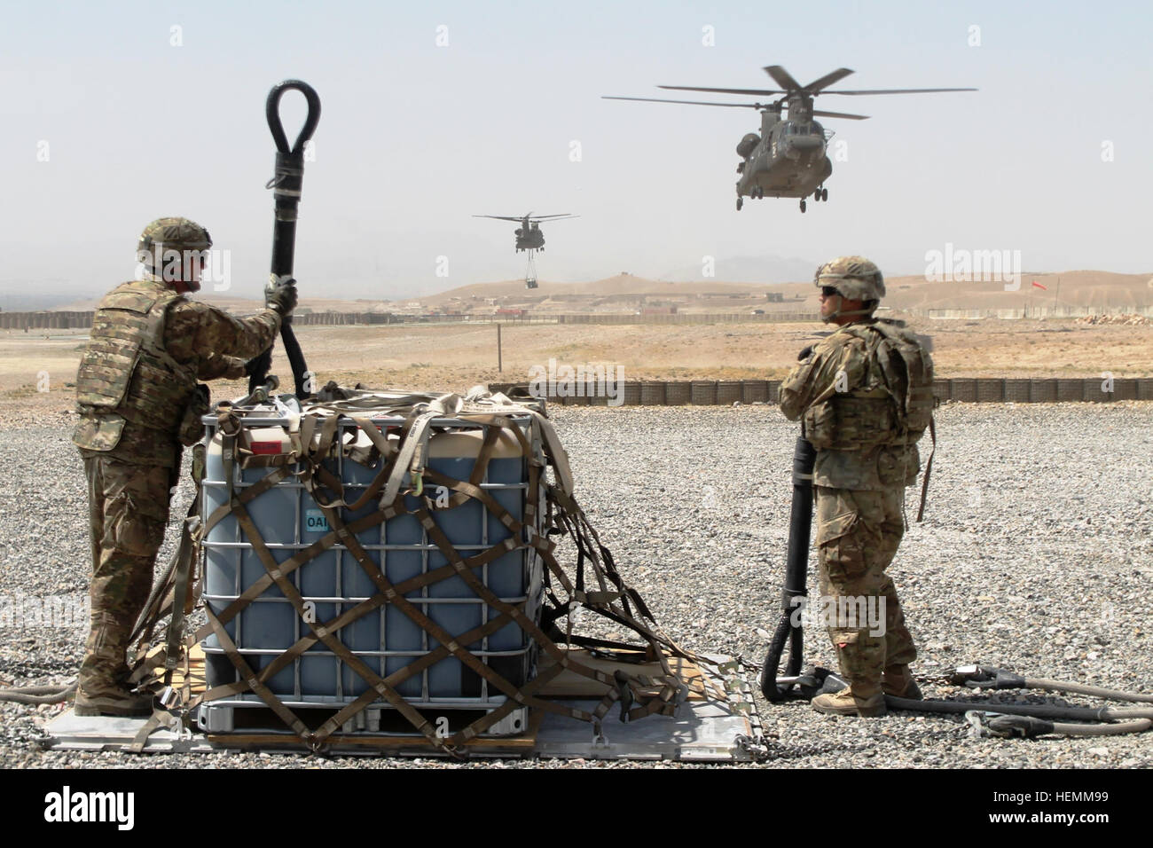 Spc Brett Alkire Hands Spc Nicholas Scott Both Machinist Welders From Bravo Company 703Rd