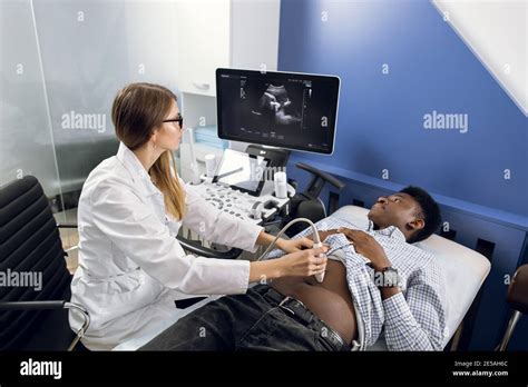 Technicians Using Ultrasound Machine In Clinic Stock Photo Alamy