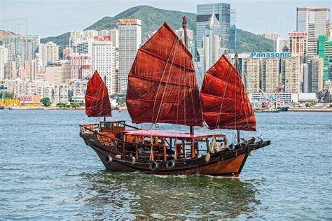 Traditional Chinese Junk Sailing At Victoria Harbour In Hong Kong China Stock Photo Dissolve