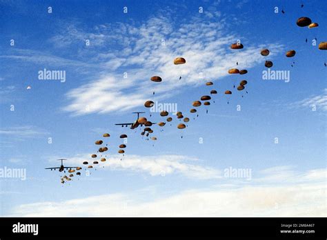 Two Groups Of Paratroopers From The 82Nd Airborne Division Jump From A Pair Of 436Th Military