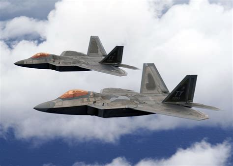 Two United States Air Force Usaf F 22A Raptor Stealth Fighter Jets Fly Over Joint Base Pearl