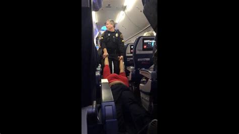 Video Woman Dragged Off Delta Flight From Detroit